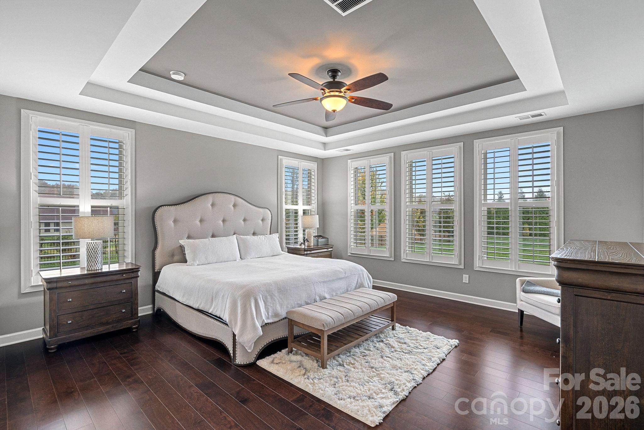 706 Blaise Court Matthews, NC 28104 - Photo 22 of 48 a bedroom with a large bed and a window