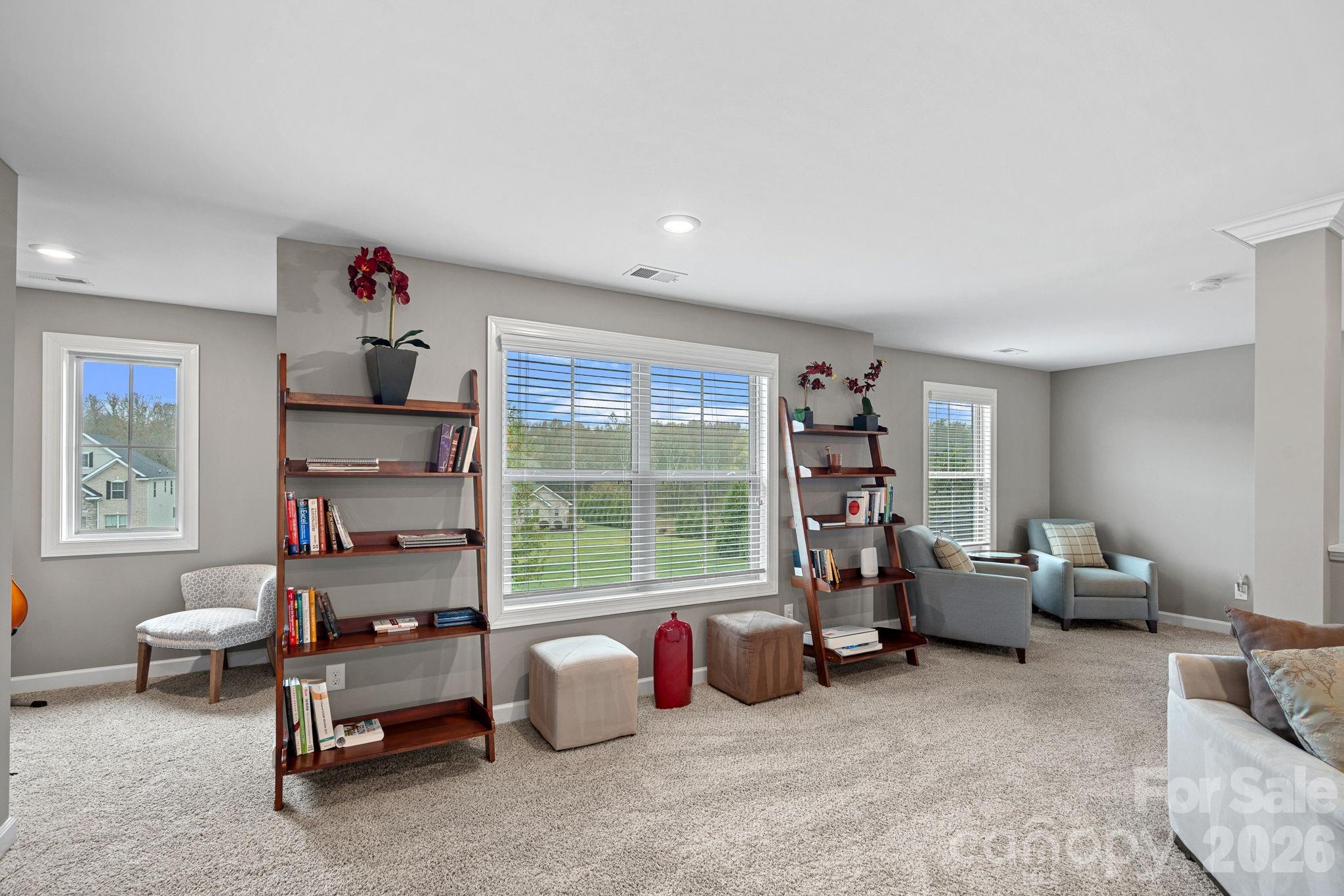 706 Blaise Court Matthews, NC 28104 - Photo 31 of 48 a room with furniture and a window