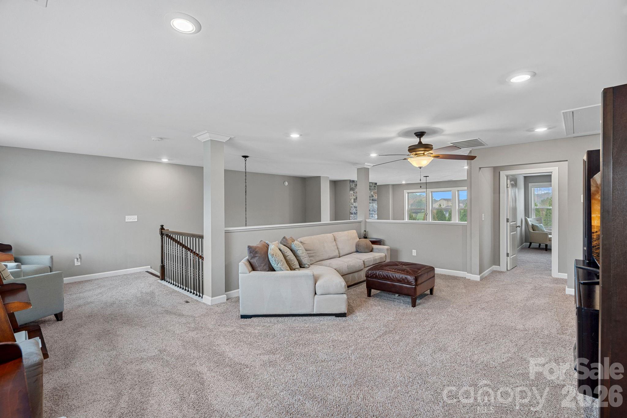 706 Blaise Court Matthews, NC 28104 - Photo 33 of 48 a living room with furniture and a table