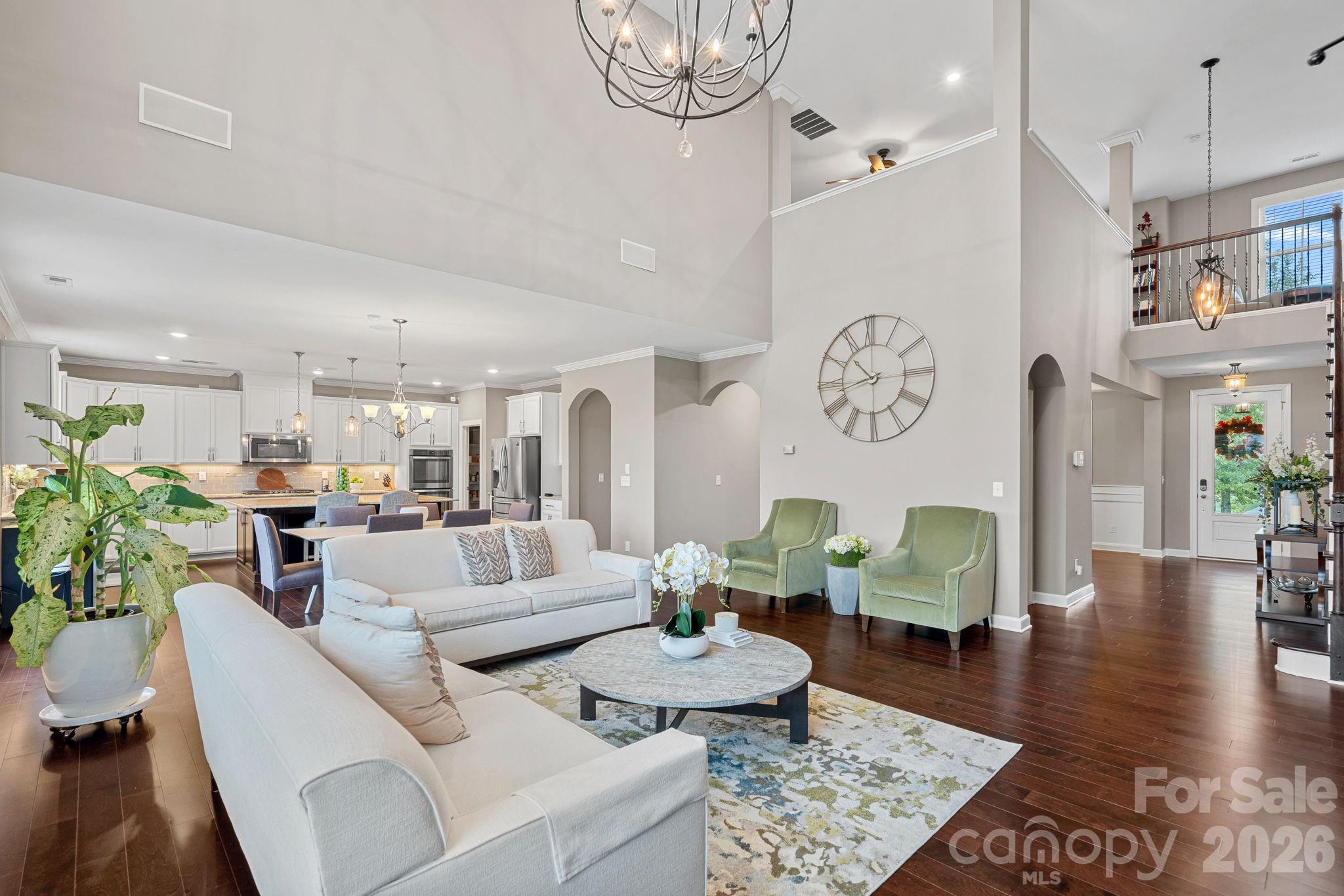 706 Blaise Court Matthews, NC 28104 - Photo 9 of 48 a living room with furniture and a table