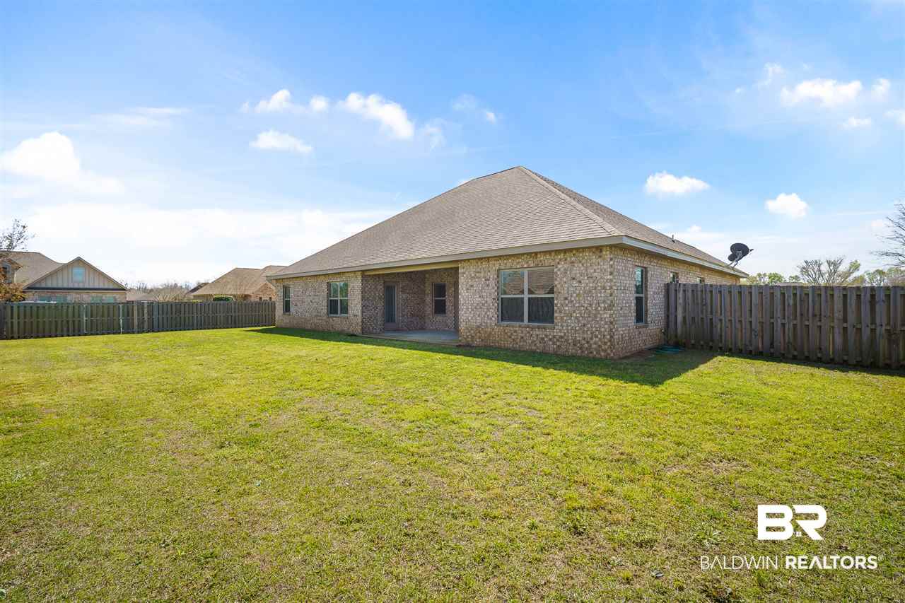 9869 Evanston Street Daphne, AL 36526 - Photo 23 of 36 Fenced Backyard