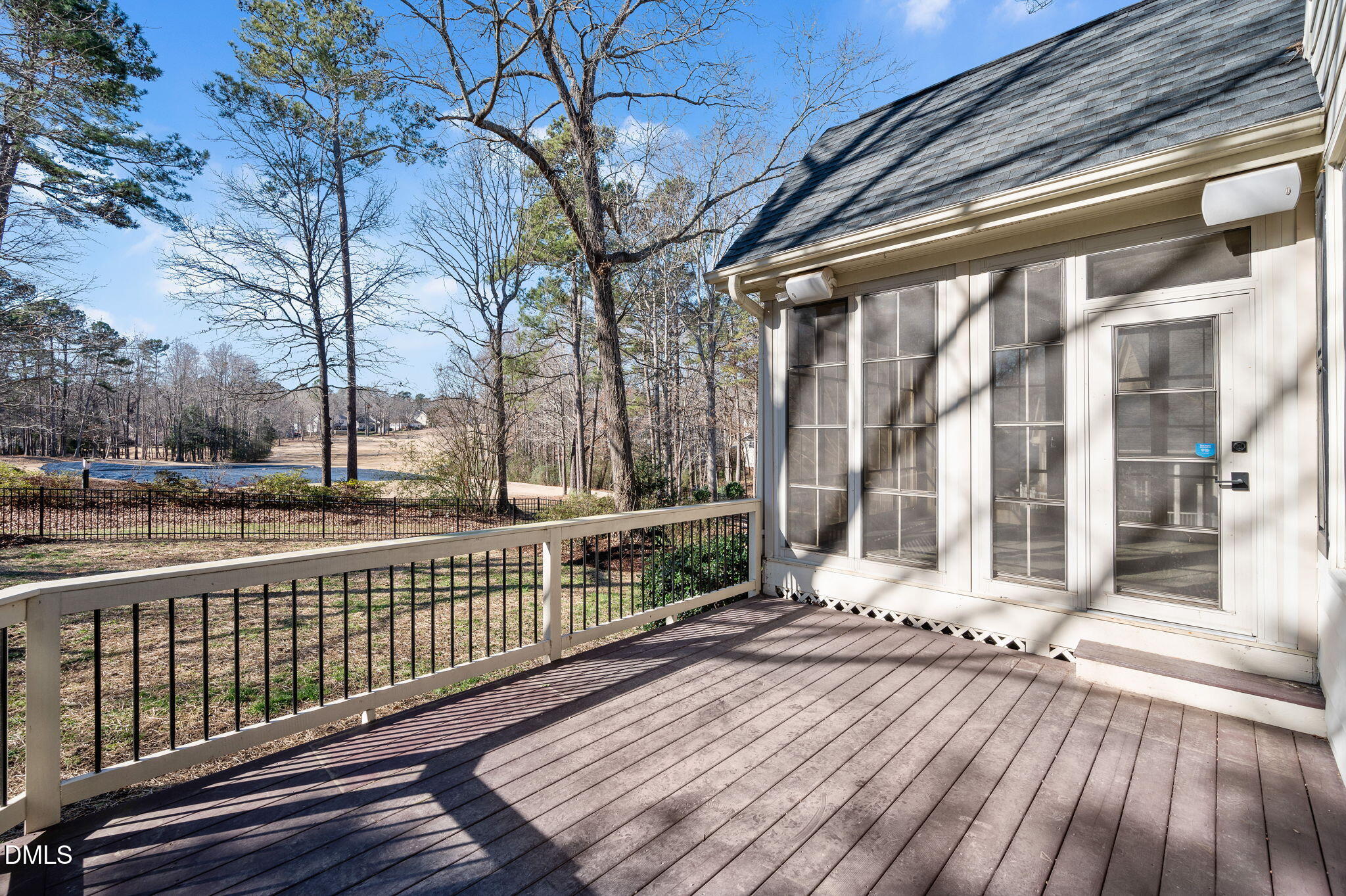 1009 Neuse Ridge Drive Clayton, NC 27527 - Photo 36 of 39 Deck with Sunroom and View