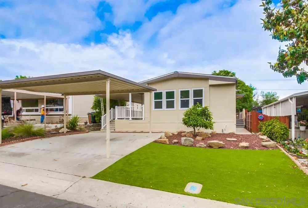 1120 Pepper Drive, Unit 78 El Cajon, CA 92021 - Photo 1 of 16 a view of a house with a backyard