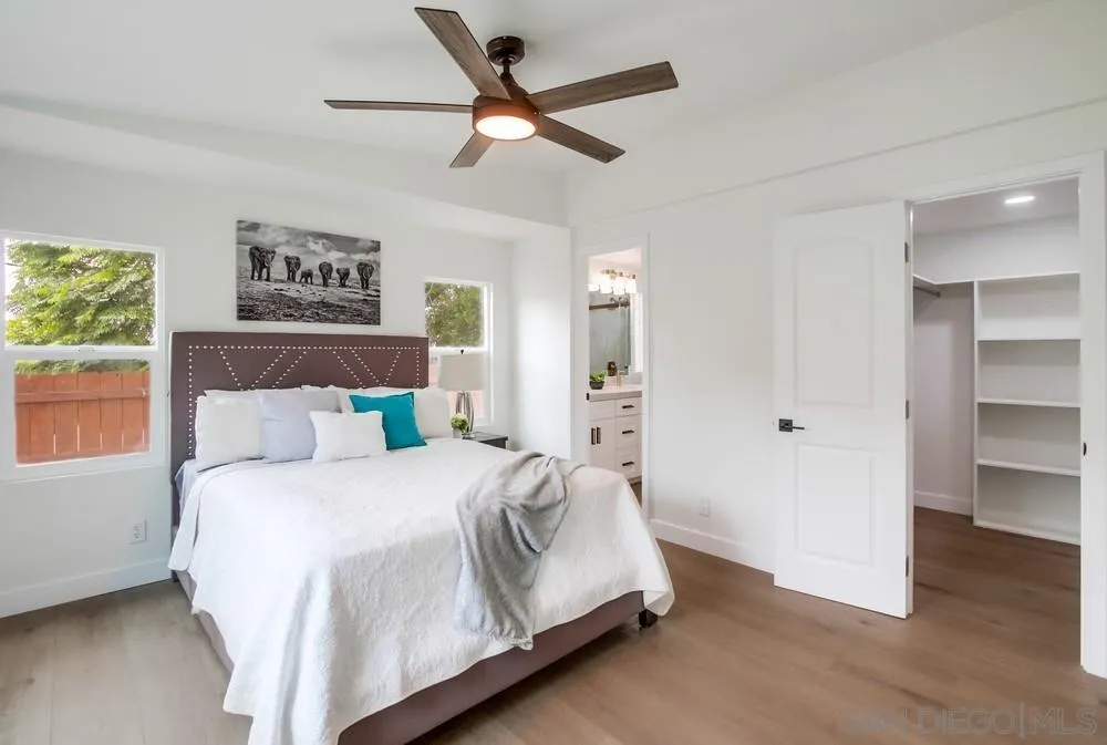 1120 Pepper Drive, Unit 78 El Cajon, CA 92021 - Photo 9 of 16 a bedroom with a bed and a ceiling fan