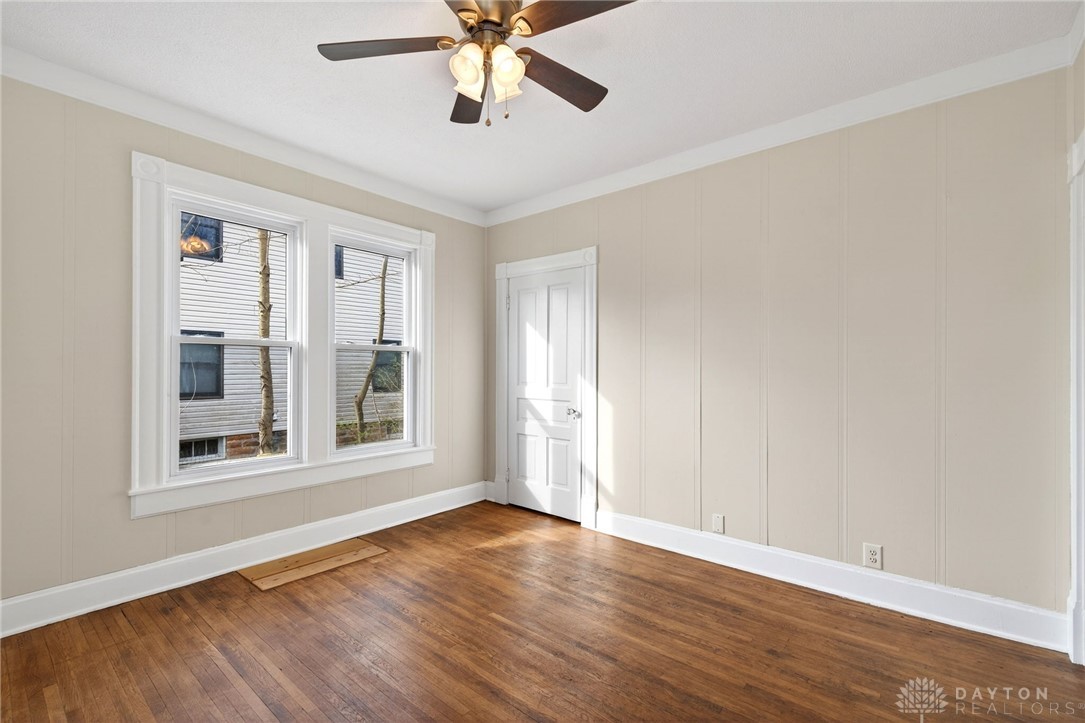 585 North Spring Street Wilmington, OH 45177 - Photo 11 of 21 This airy room features rich hardwood flooring and abundant natural light.