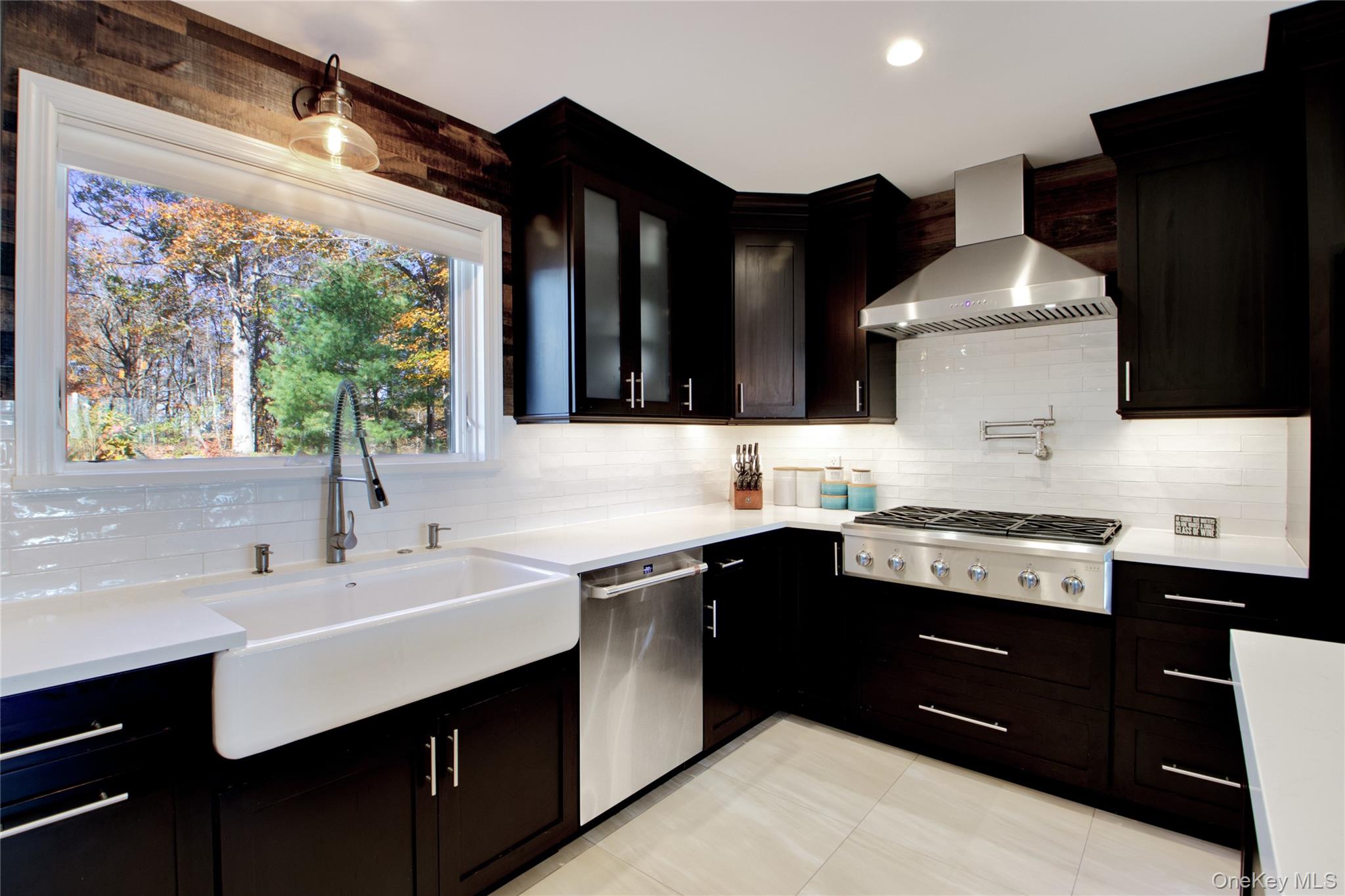 26 Summit Cir Drive Mahopac, NY 10541 - Photo 13 of 32 a kitchen with a sink stove and refrigerator