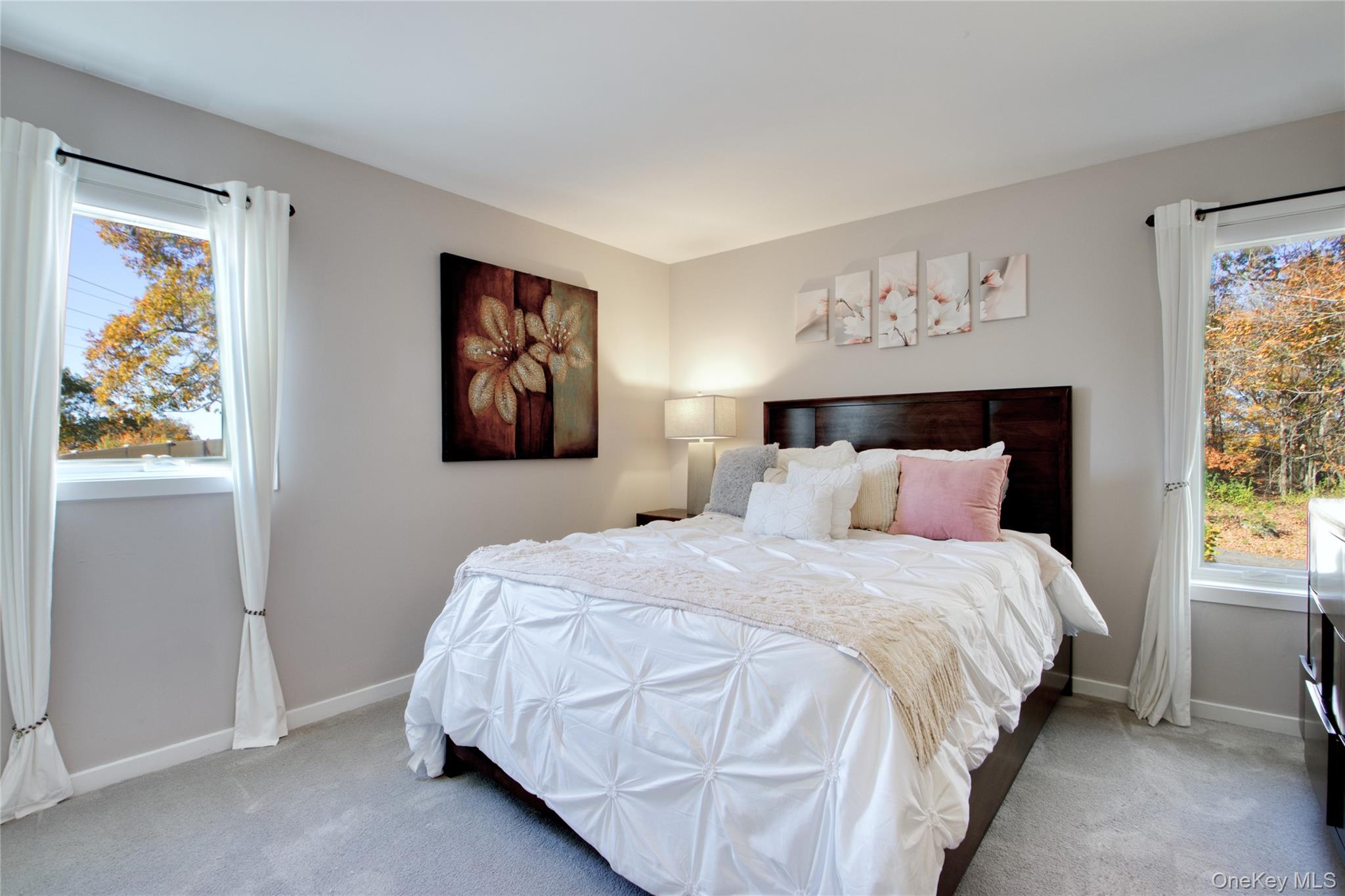 26 Summit Cir Drive Mahopac, NY 10541 - Photo 15 of 32 a bedroom with bed and wall painting with wooden floor