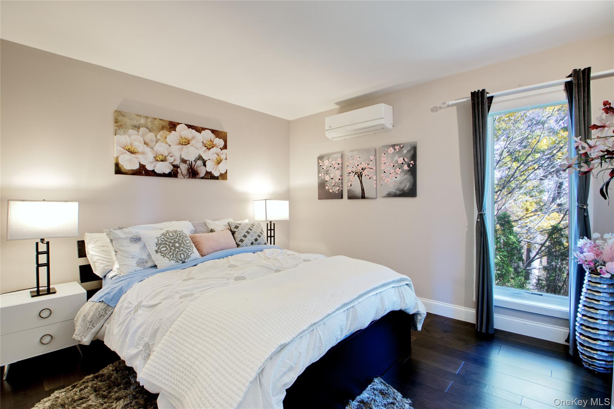 26 Summit Cir Drive Mahopac, NY 10541 - Photo 16 of 32 a bedroom with a bed and a painting on the wall