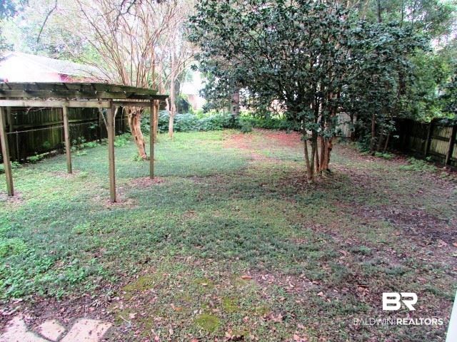 134 Hyland Avenue Mobile, AL 36607 - Photo 13 of 16 Large fenced yard, roughly 1/2 acre