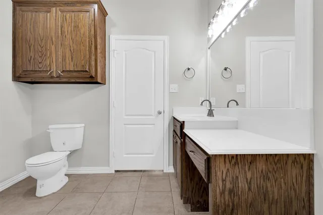 an aerial view of mountains with green space