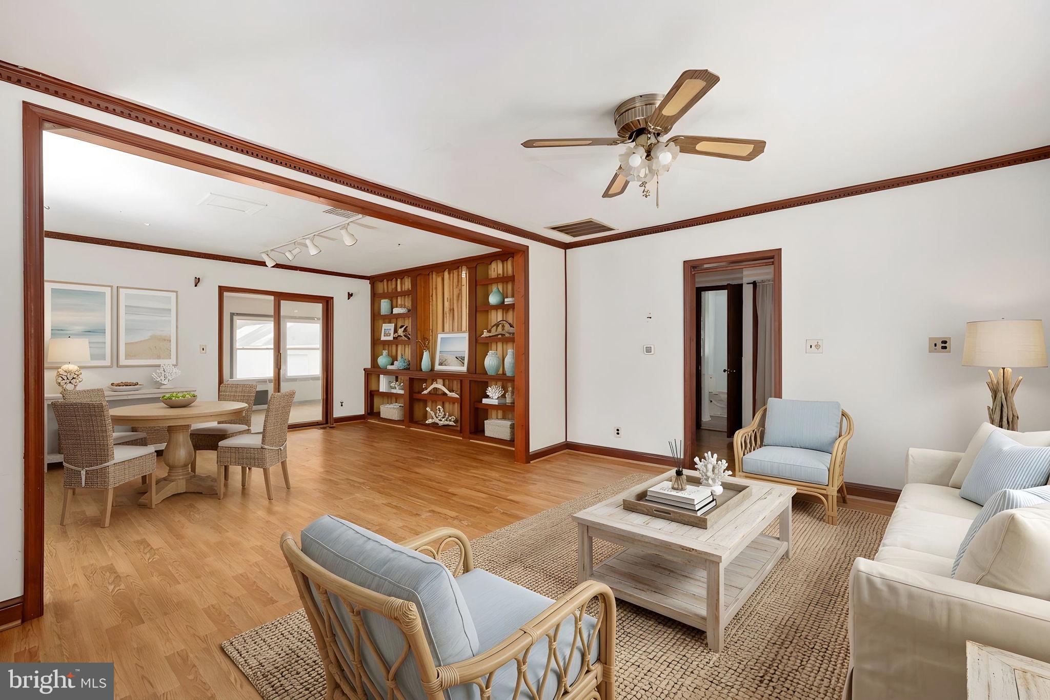1881 Fairport Road Reedville, VA 22539 - Photo 16 of 57 a living room with furniture and a large window