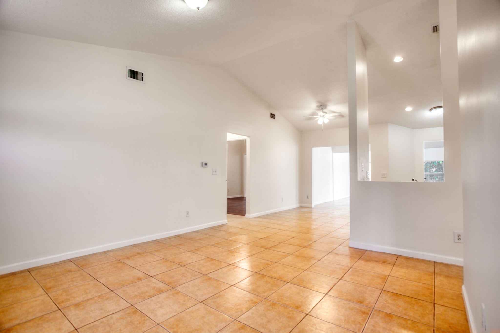 4302 Southwest Jaunt Road Port St. Lucie, FL 34953 - Photo 13 of 32 a view of an empty room and window