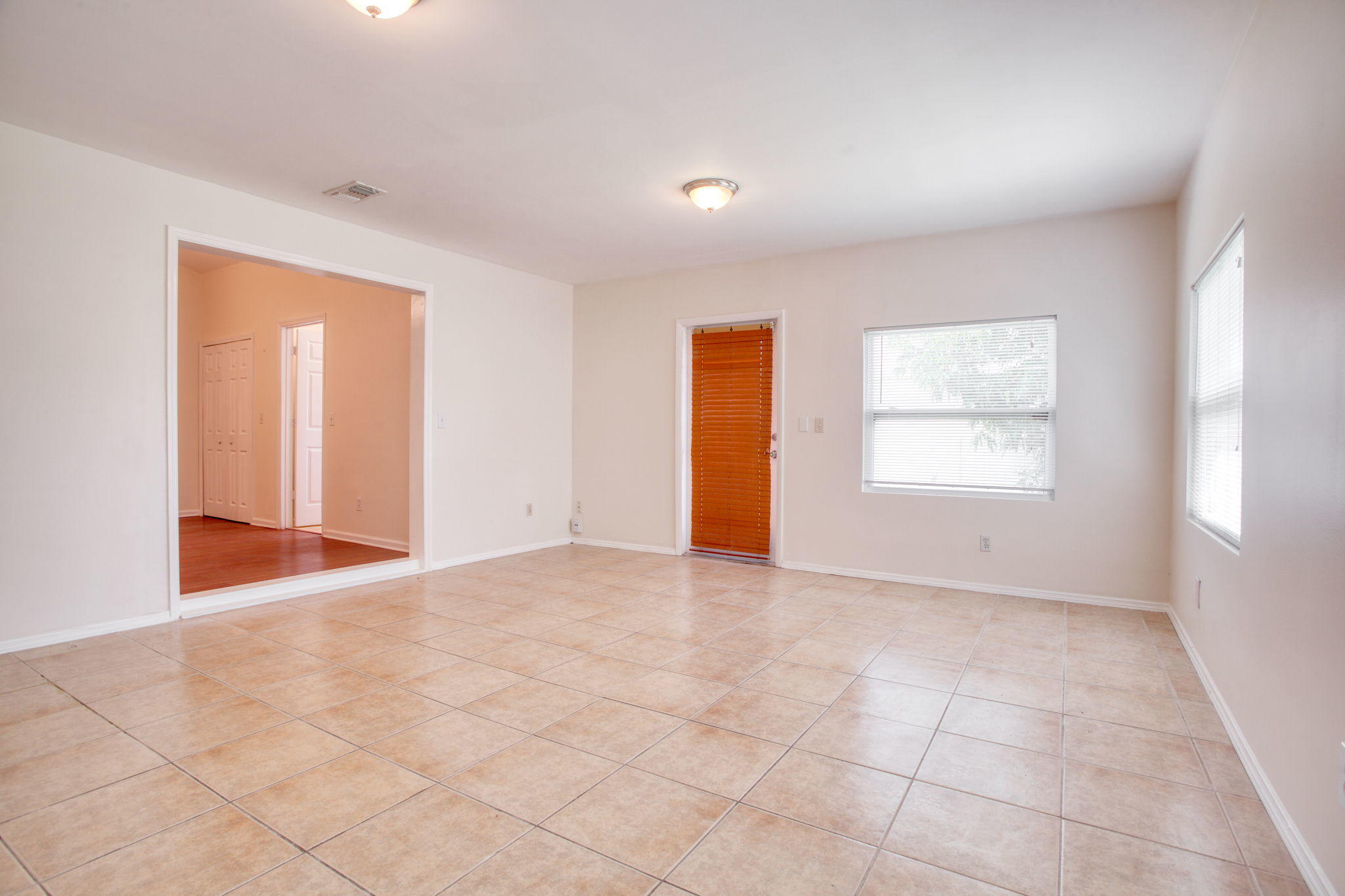 4302 Southwest Jaunt Road Port St. Lucie, FL 34953 - Photo 15 of 32 an empty room with windows and closet