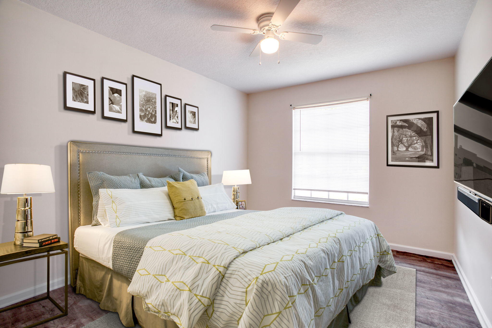 4302 Southwest Jaunt Road Port St. Lucie, FL 34953 - Photo 23 of 32 a bedroom with a large bed and a chandelier