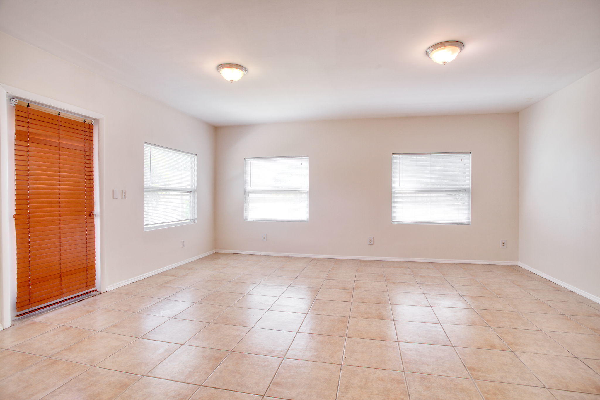 4302 Southwest Jaunt Road Port St. Lucie, FL 34953 - Photo 28 of 32 a view of an empty room with a window