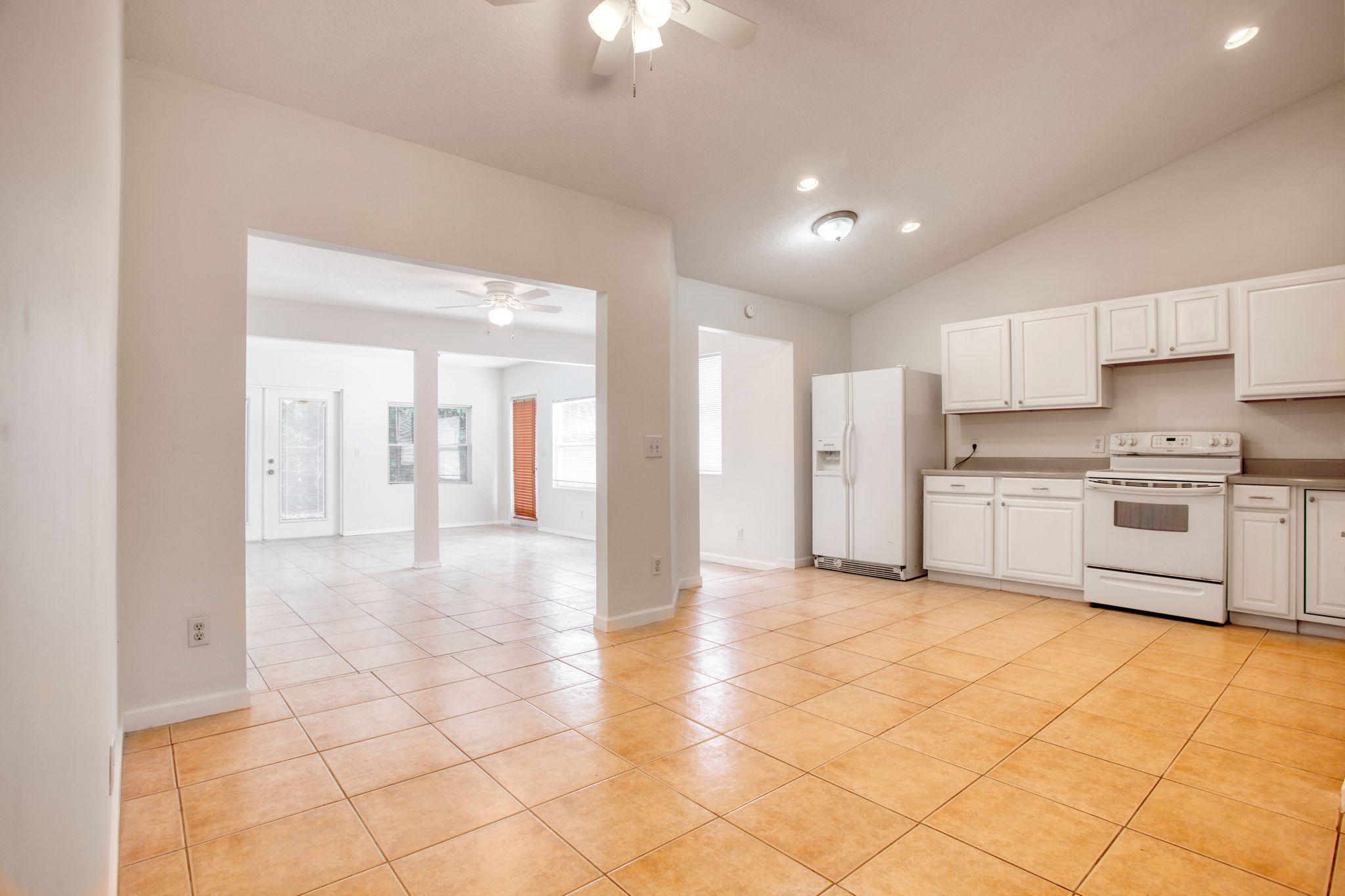 4302 Southwest Jaunt Road Port St. Lucie, FL 34953 - Photo 8 of 32 a view of a kitchen with a sink and cabinets