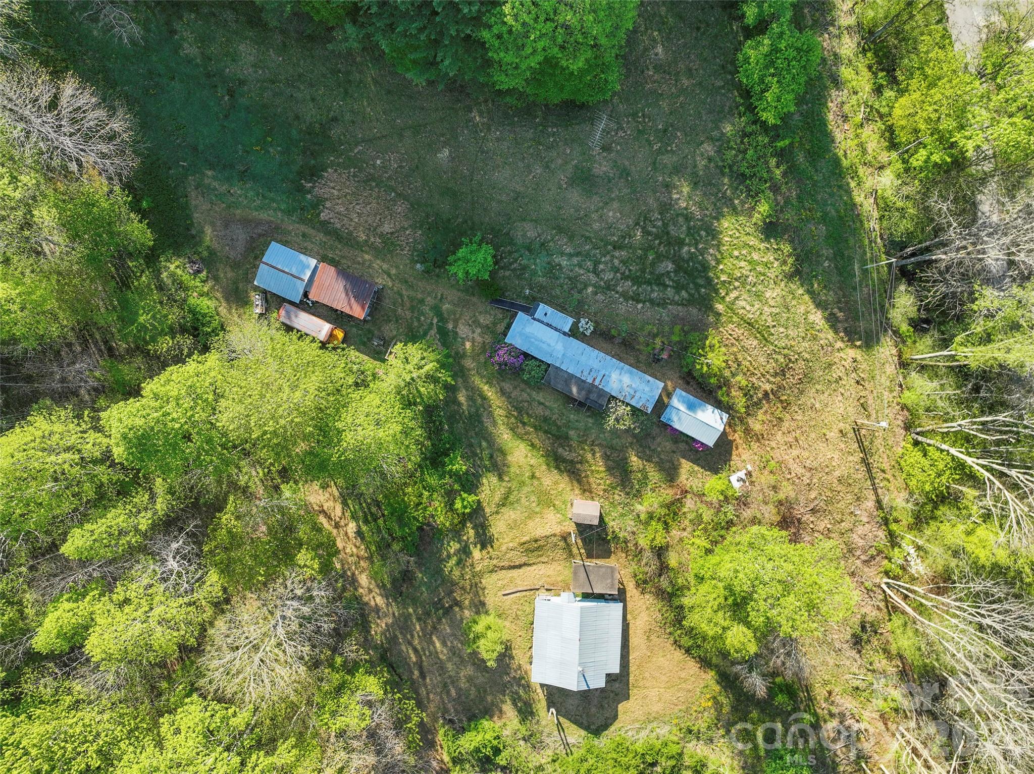 3454 Puncheon Fork Road Mars Hill, NC 28754 - Photo 7 of 18 a bird view of a house with a yard