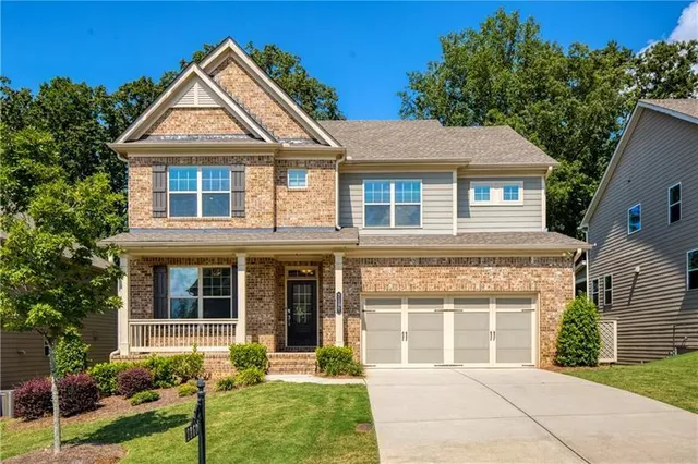 front view of a house with a yard