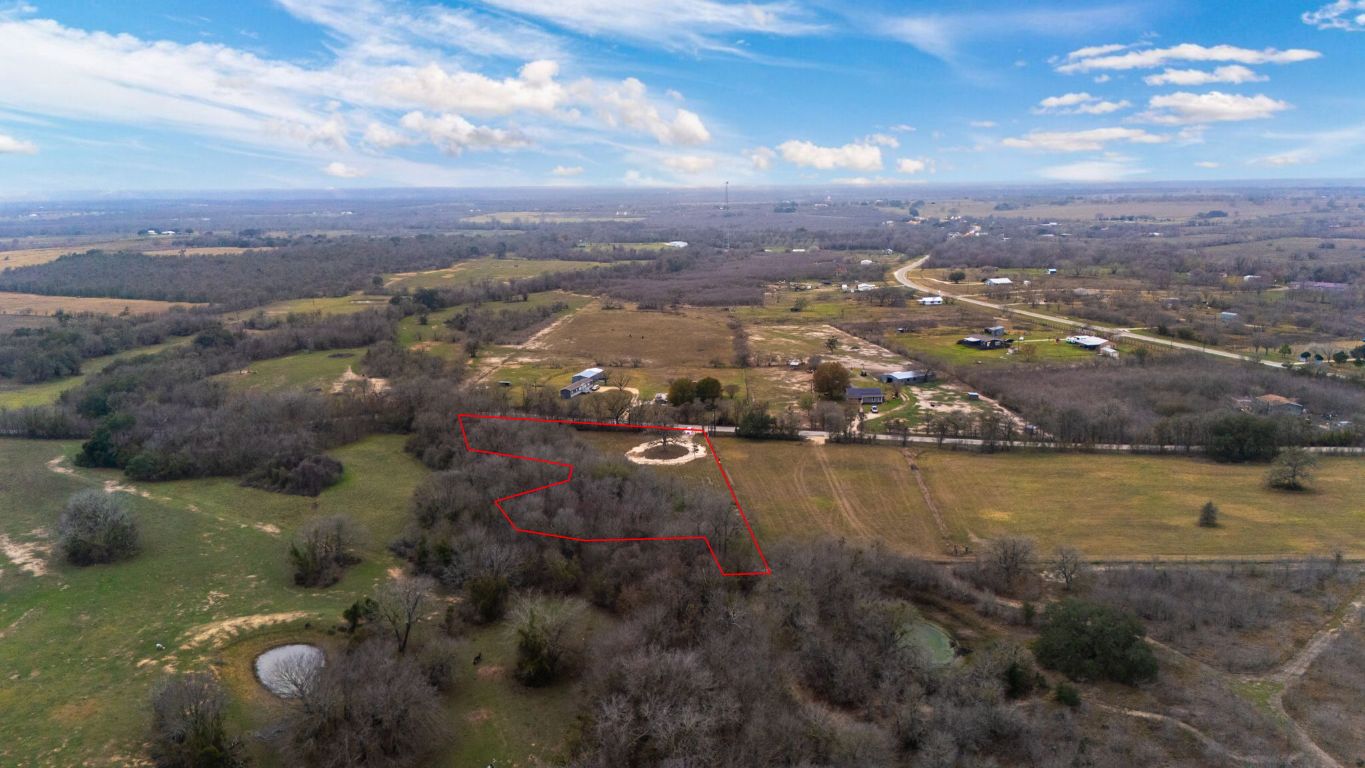 199 Sand Hill Road Dale, TX 78616 - Photo 8 of 18 an aerial view of residential houses with outdoor space