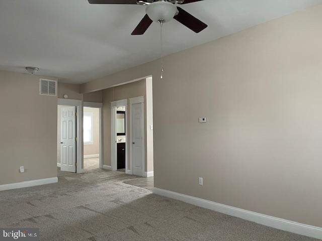 346 Coolidge Avenue Carneys Point, NJ 08069 - Photo 10 of 24 an empty room with closet and a ceiling fan