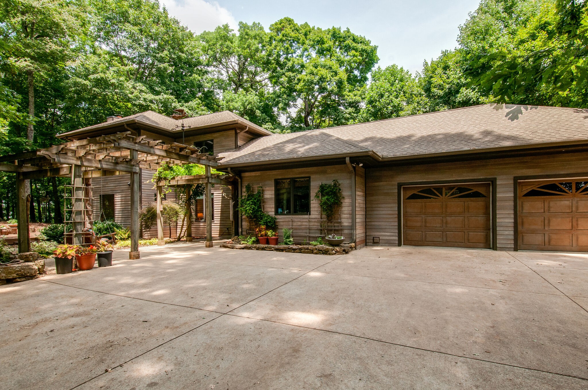 a view of a house with outdoor seating