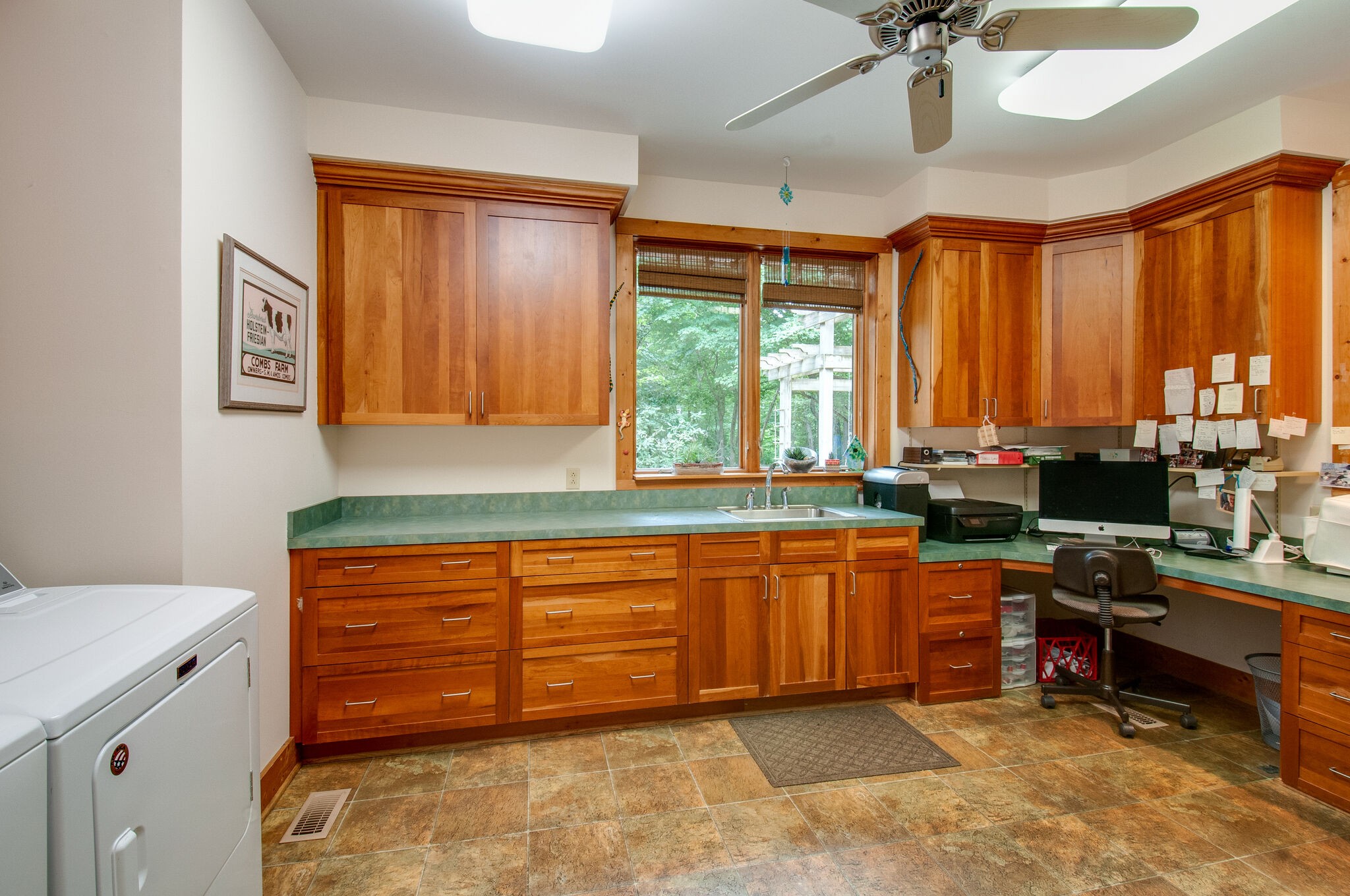 438 Grayson Drive Nashville, TN 37205 - Photo 12 of 36 a kitchen with stainless steel appliances granite countertop sink stove and cabinets