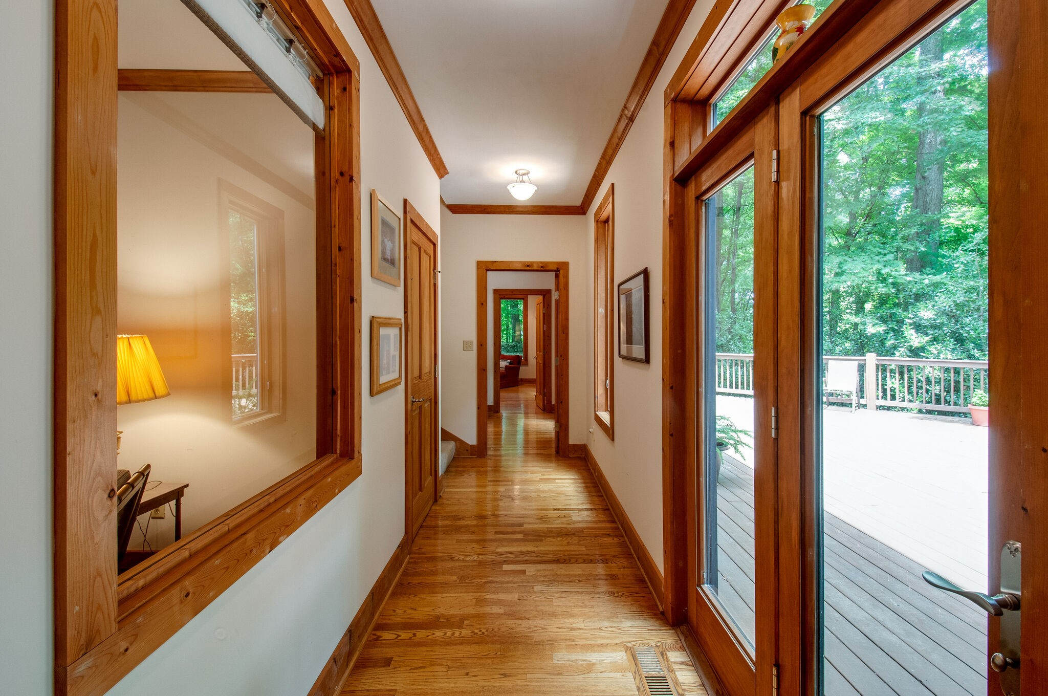438 Grayson Drive Nashville, TN 37205 - Photo 13 of 36 a view of a hallway with wooden floor and staircase