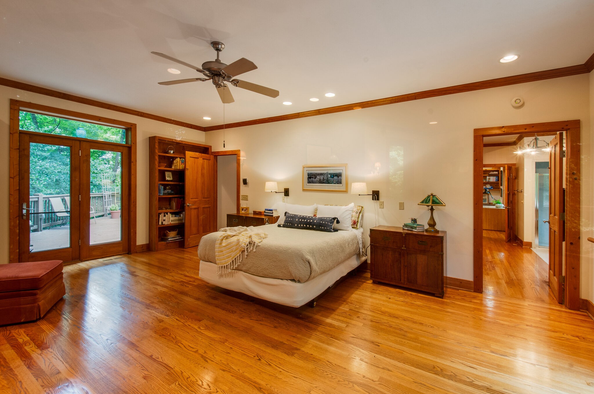 438 Grayson Drive Nashville, TN 37205 - Photo 16 of 36 a spacious bedroom with a large bed and a chandelier