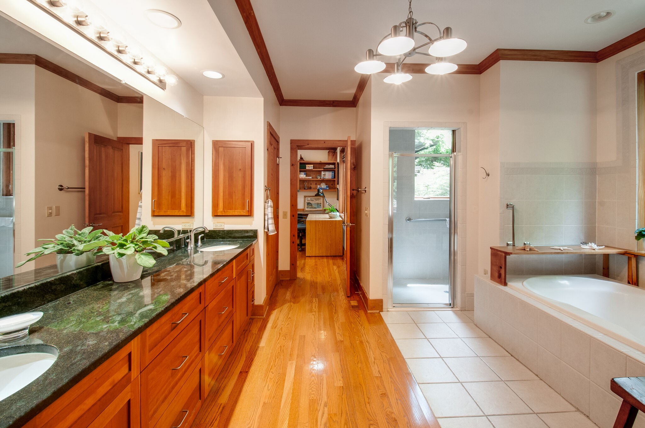 438 Grayson Drive Nashville, TN 37205 - Photo 17 of 36 a spacious bathroom with a granite countertop sink and a large mirror