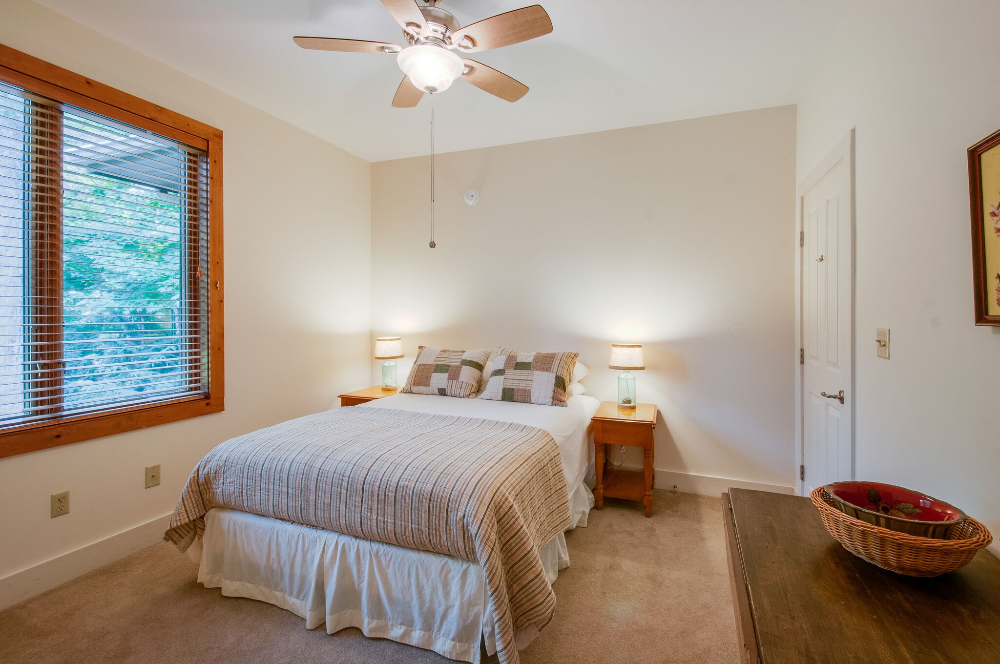 438 Grayson Drive Nashville, TN 37205 - Photo 19 of 36 a bedroom with a bed and a chandelier