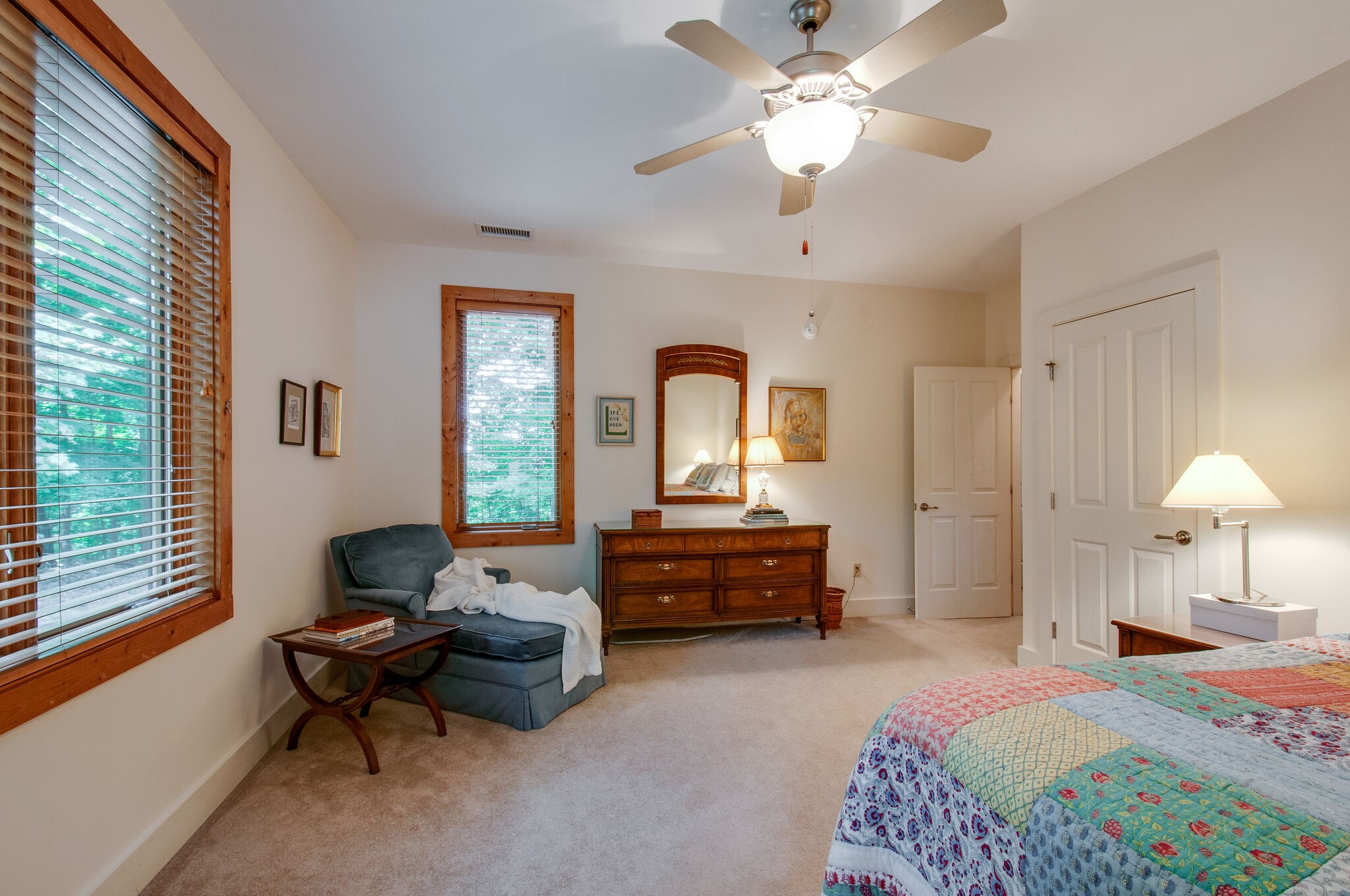 438 Grayson Drive Nashville, TN 37205 - Photo 22 of 36 a bedroom with a bed and a chandelier