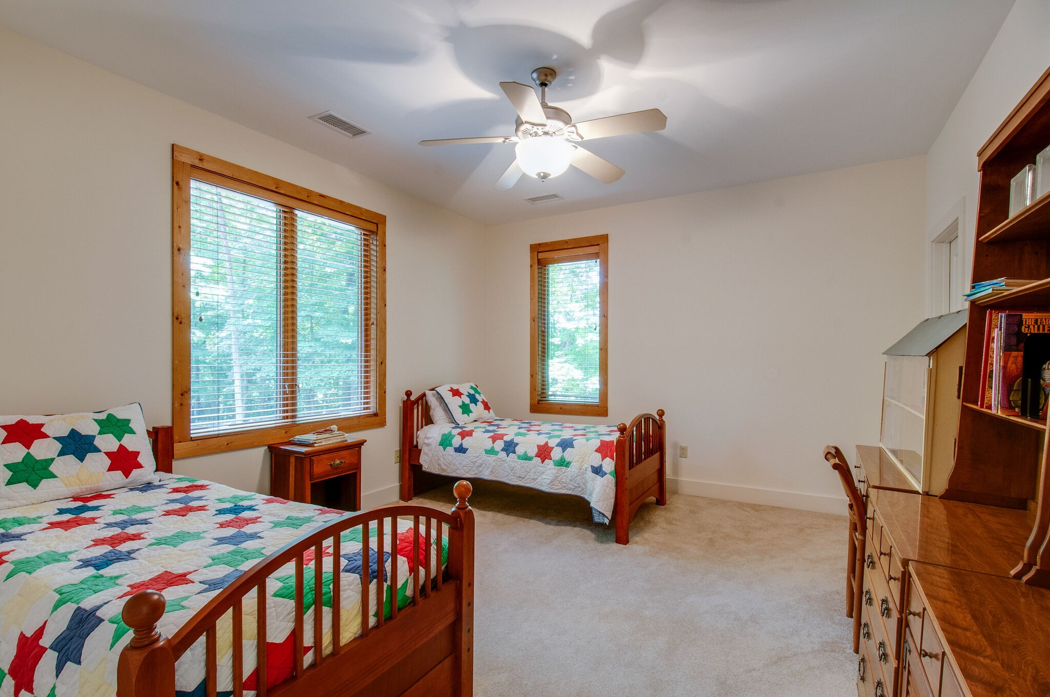 438 Grayson Drive Nashville, TN 37205 - Photo 23 of 36 a bedroom with furniture and a chandelier
