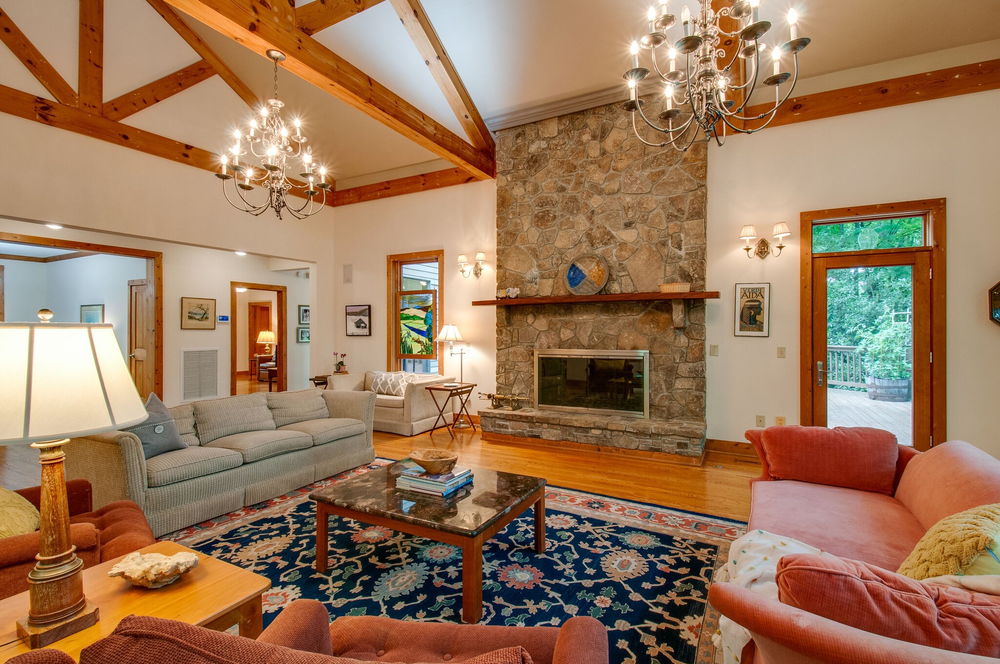 438 Grayson Drive Nashville, TN 37205 - Photo 5 of 36 a living room with furniture a chandelier and a fireplace