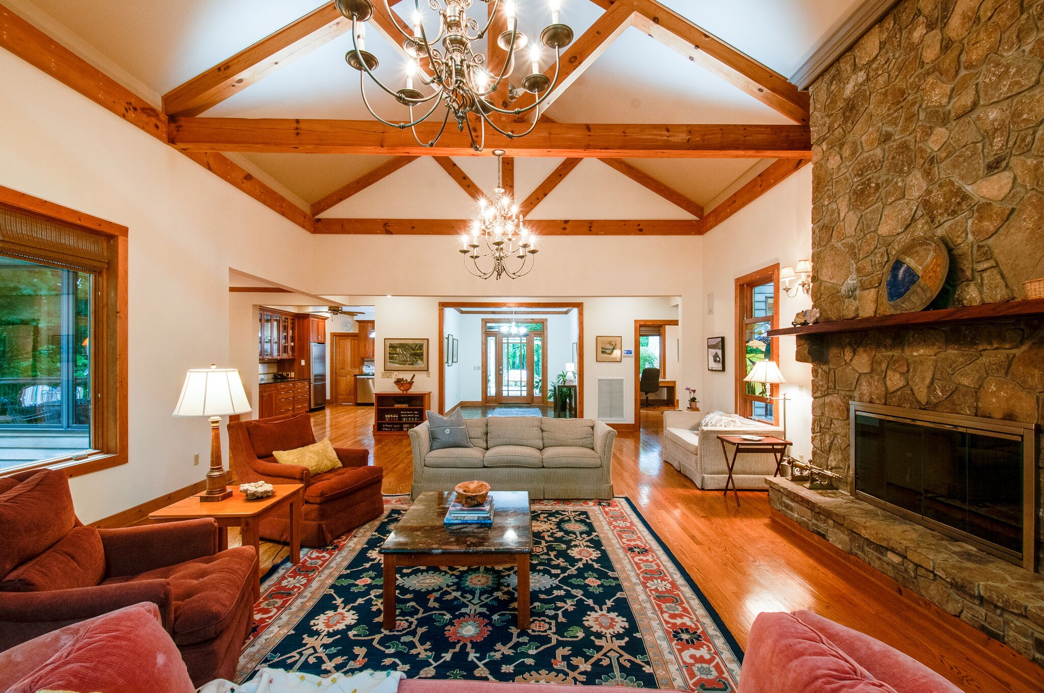 438 Grayson Drive Nashville, TN 37205 - Photo 6 of 36 a living room with furniture a fireplace and a flat screen tv