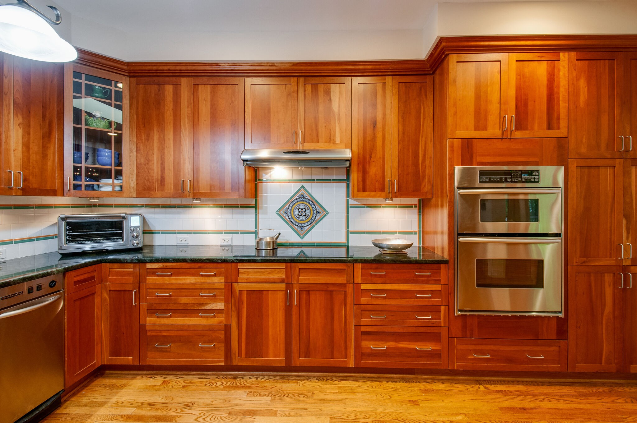 438 Grayson Drive Nashville, TN 37205 - Photo 10 of 36 a kitchen with stainless steel appliances granite countertop a refrigerator and cabinets
