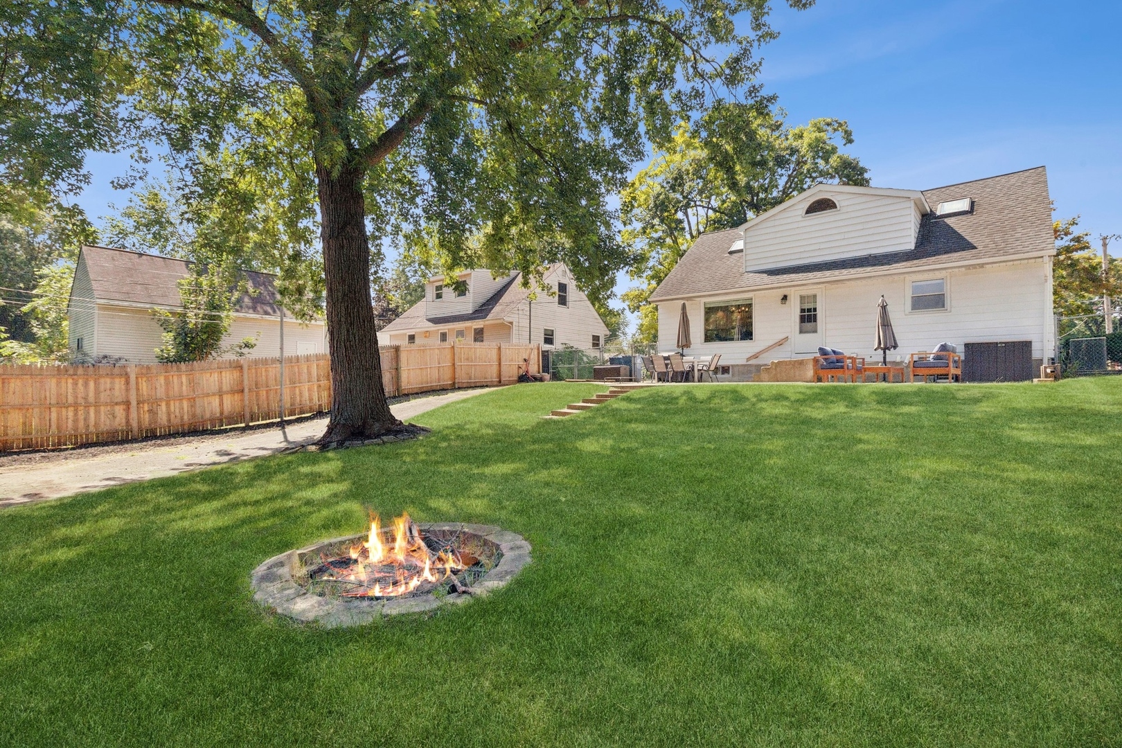 33423 North Mill Road Grayslake, IL 60030 - Photo 16 of 22 a backyard of a house with table and sofas