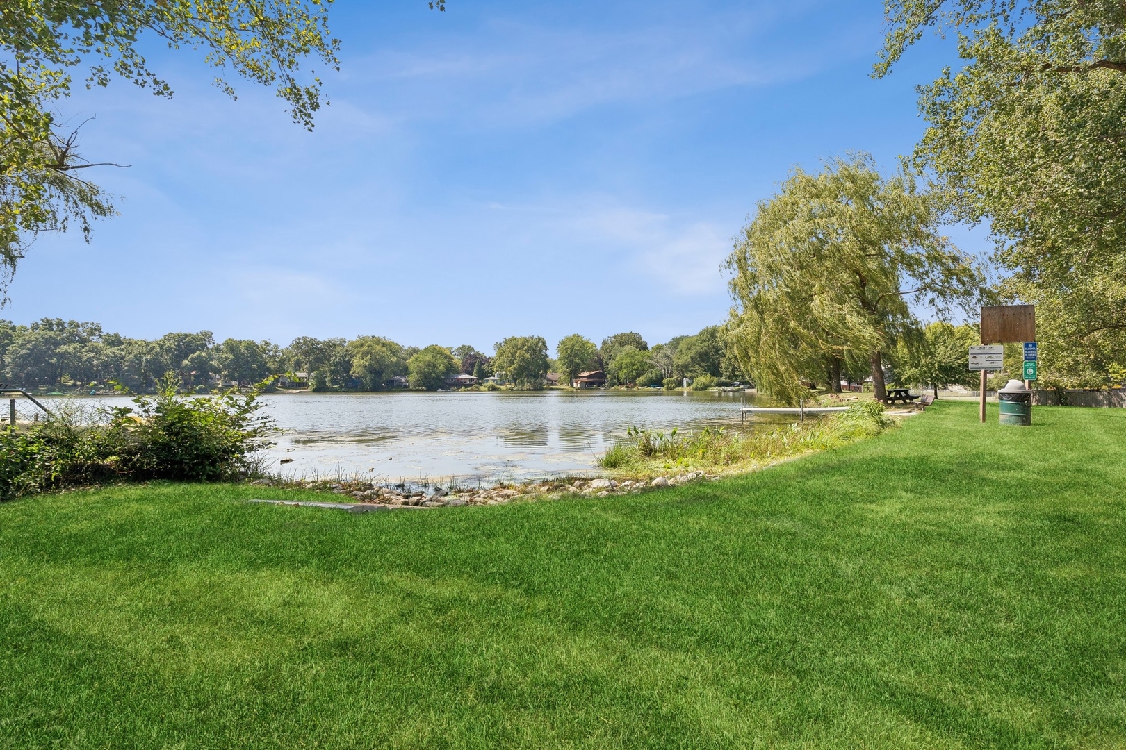 33423 North Mill Road Grayslake, IL 60030 - Photo 17 of 22 a view of lake with houses in the back