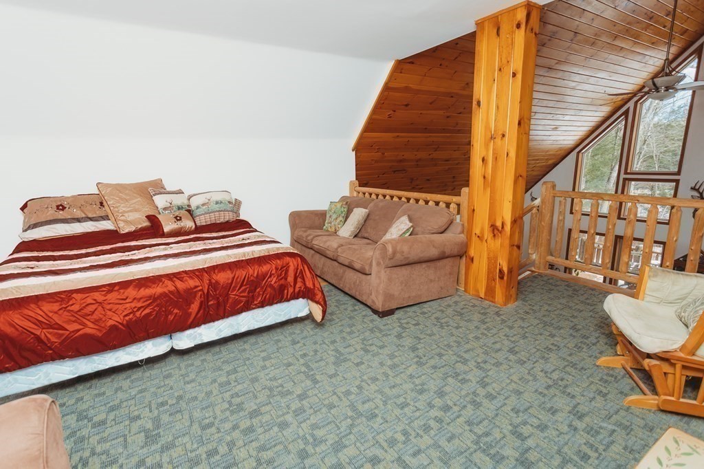 123 Davis Mine Road Rowe, MA 01367 - Photo 21 of 41 a bedroom with furniture and a couch