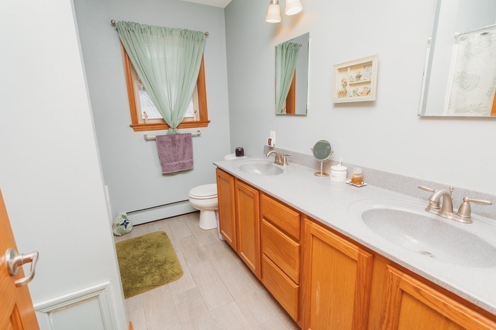123 Davis Mine Road Rowe, MA 01367 - Photo 24 of 41 a bathroom with a sink and a mirror