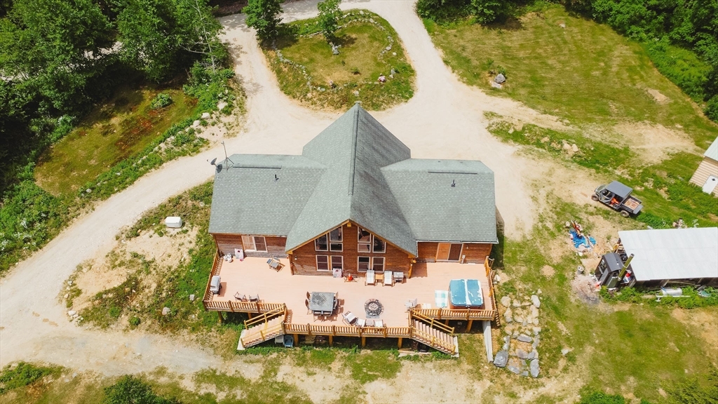 123 Davis Mine Road Rowe, MA 01367 - Photo 38 of 41 an aerial view of a house with swimming pool