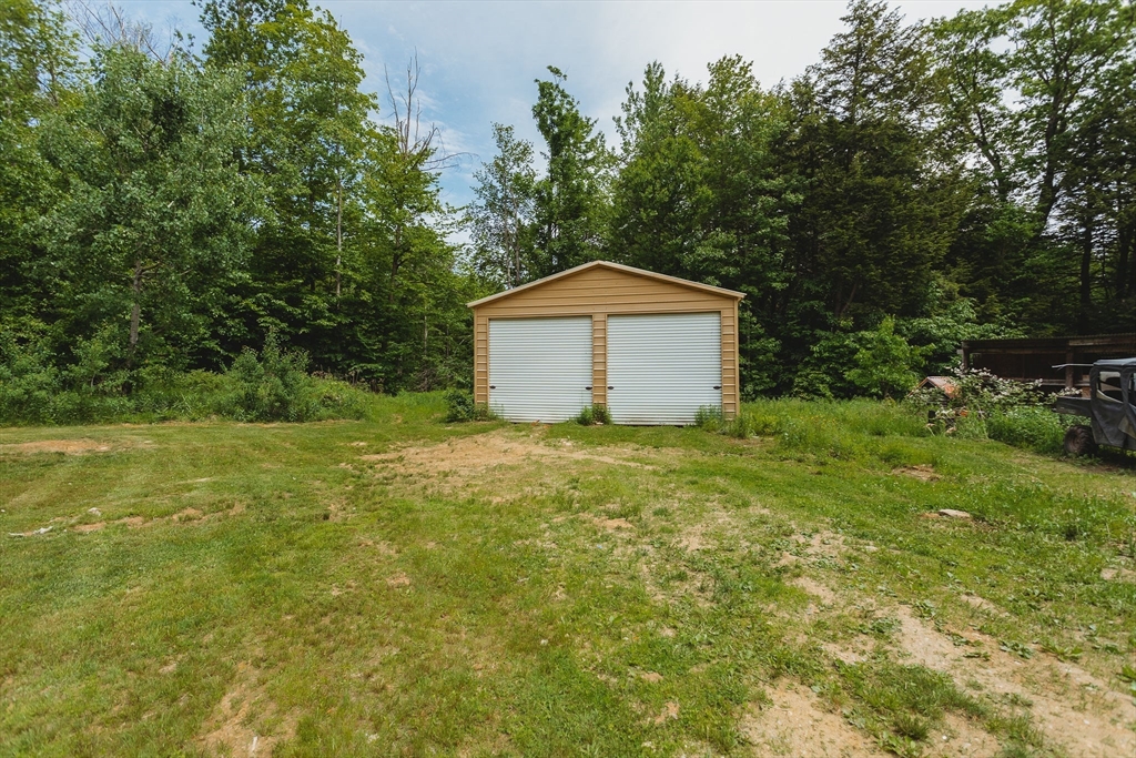 123 Davis Mine Road Rowe, MA 01367 - Photo 40 of 41 a view of a house with a yard