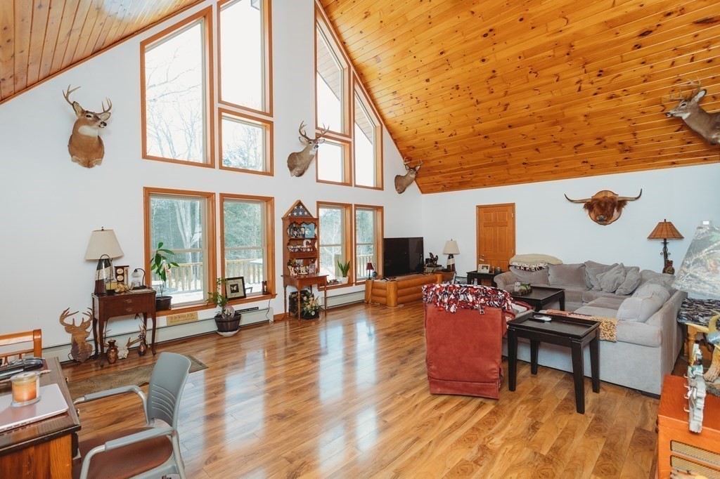 123 Davis Mine Road Rowe, MA 01367 - Photo 4 of 41 a living room with furniture and wooden floor