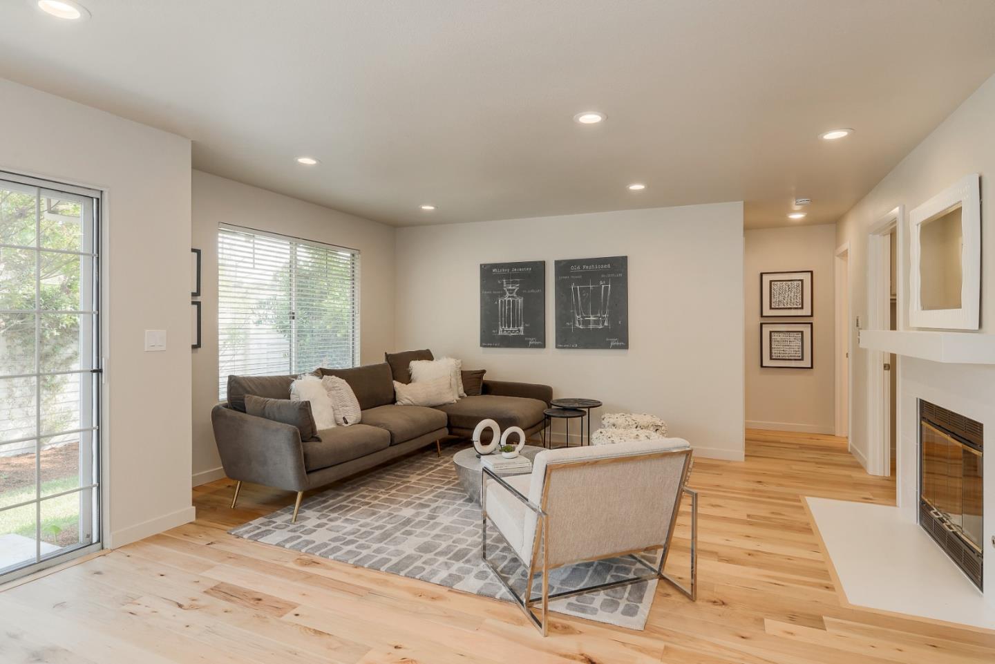 305 Windmill Park Lane Mountain View, CA 94043 - Photo 13 of 28 a living room with furniture and a fireplace