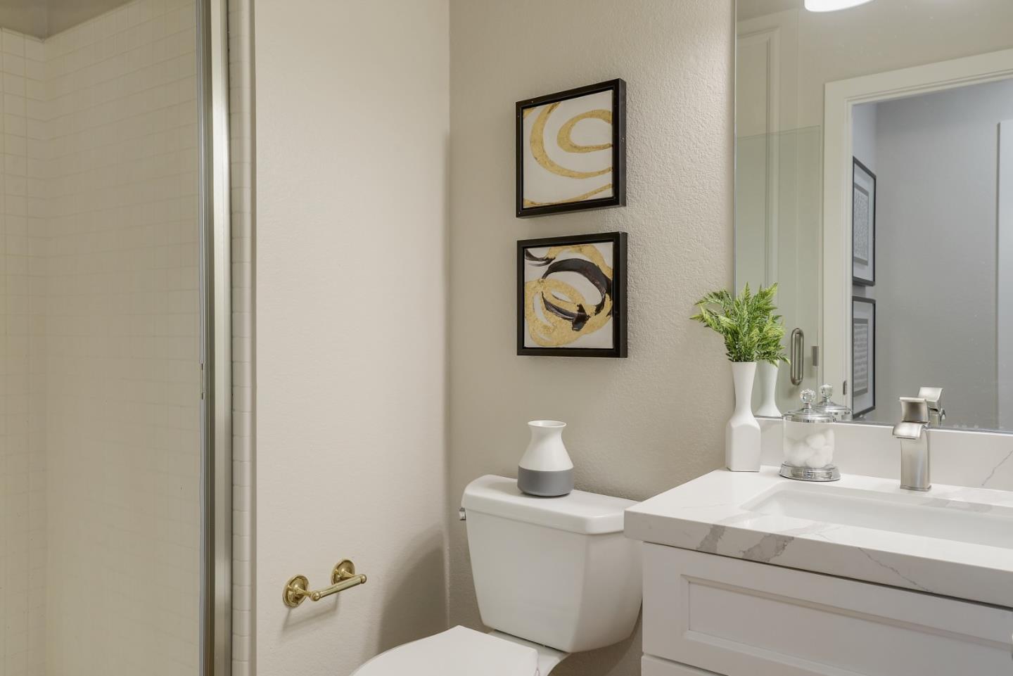 305 Windmill Park Lane Mountain View, CA 94043 - Photo 16 of 28 a bathroom with a toilet a sink and mirror