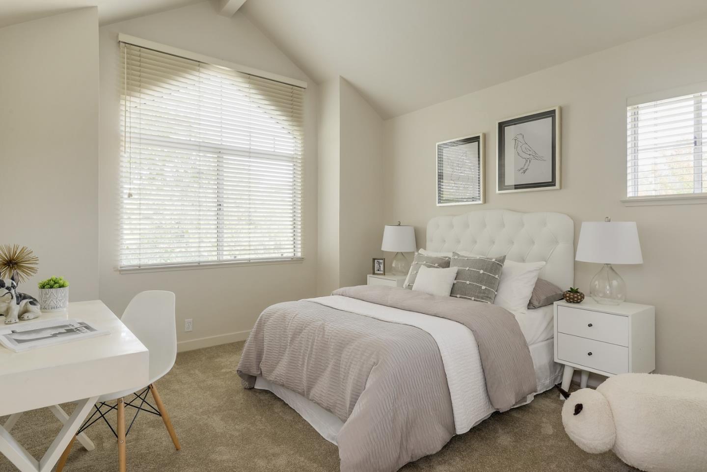 305 Windmill Park Lane Mountain View, CA 94043 - Photo 19 of 28 a bedroom with a bed and a table in it with window