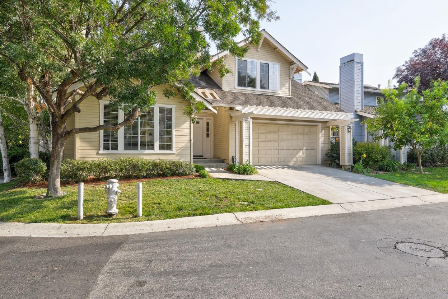 305 Windmill Park Lane Mountain View, CA 94043 - Photo 2 of 28 front view of a house with a yard