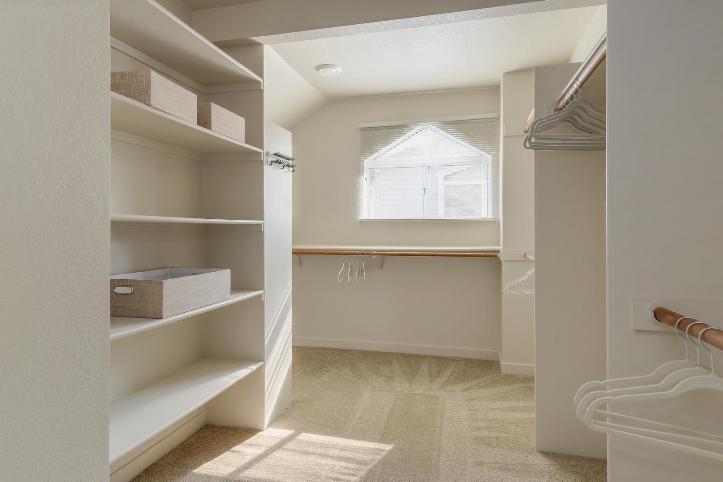 305 Windmill Park Lane Mountain View, CA 94043 - Photo 21 of 28 a view of walk in closet with empty racks