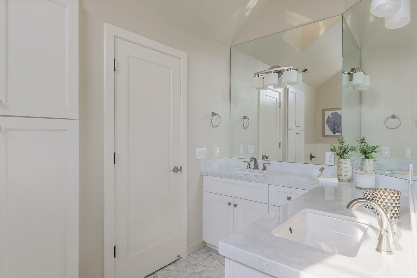305 Windmill Park Lane Mountain View, CA 94043 - Photo 23 of 28 a bathroom with a sink and a mirror