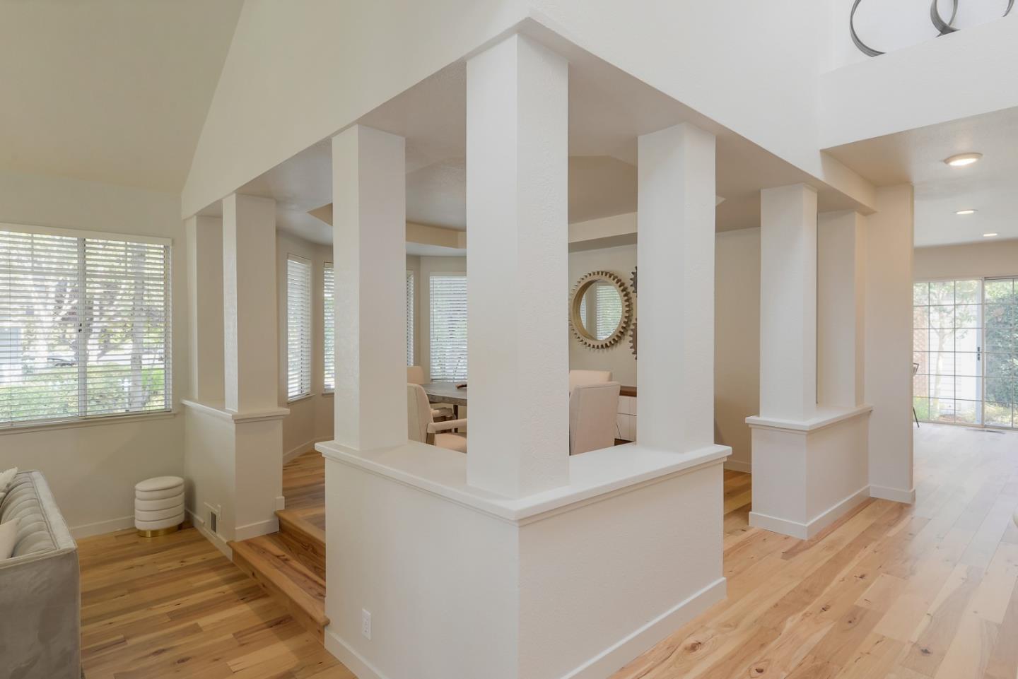 305 Windmill Park Lane Mountain View, CA 94043 - Photo 7 of 28 a room with a bed and large window