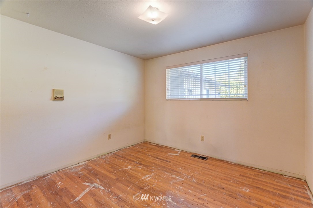 1822 234th Place Southwest Bothell, WA 98021 - Photo 14 of 23 an empty room with a window